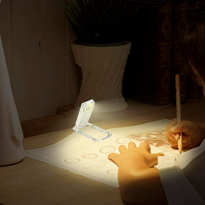ReadLed, mini LED lampa, ktorá sa dá pripevniť na knihu - Image 8